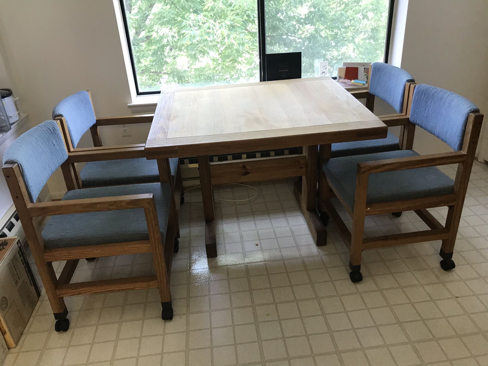 Solid wood kitchen table with four chairs