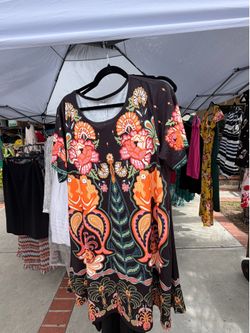 Women Dresses  different sizes, come and check. $12 each.  Skirts $ 6  Blouses $6