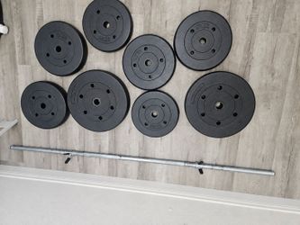 130lbs weight plates and bar