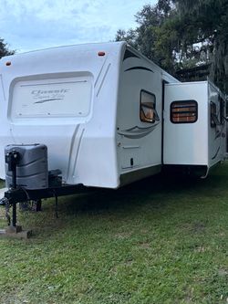 31. FT travel trailer double slide. 31. FT travel trailer double slide.