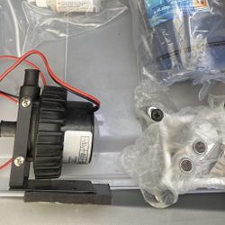 Water cooling equipment. Swiftech Pump, Swiftech Copper CPU block, tubing, clamps, nozzles 