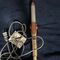 Conair® InfinitiPRO Frizz-Free Titanium Ceramic Curling Iron, 1