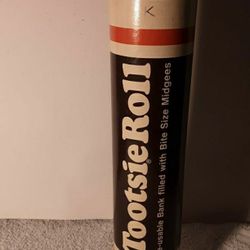 A Pair Of Tootsie Roll Toy Banks