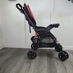 Kolcraft Black And Pink stroller