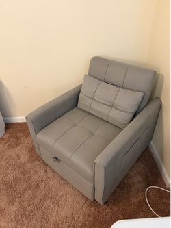 Chair that folds flat into a bed.