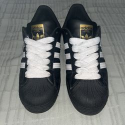 Black Adidas Superstars 