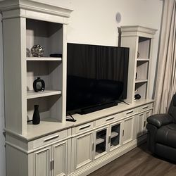 Wall unit, two pillars and the tv stand , beige color