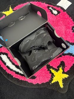Jordan 4 black cat