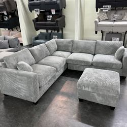 BRAND NEW GRAY CORDUROY SECTIONAL WITH OTTOMAN