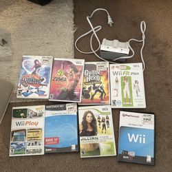 Nintendo Wii Games and charging console for handles 