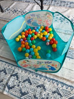 Child’s ball pit and balls
