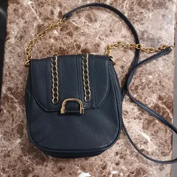 Charming charlie - classic black and gold crossbody bag with chain detail