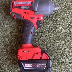  Milwaukee M18 1/2" Mid-Torque Impact Wrench with Friction Ring (FMTIWF12) and M18 REDLITHIUM™ XC5.0 Extended Capacity Battery