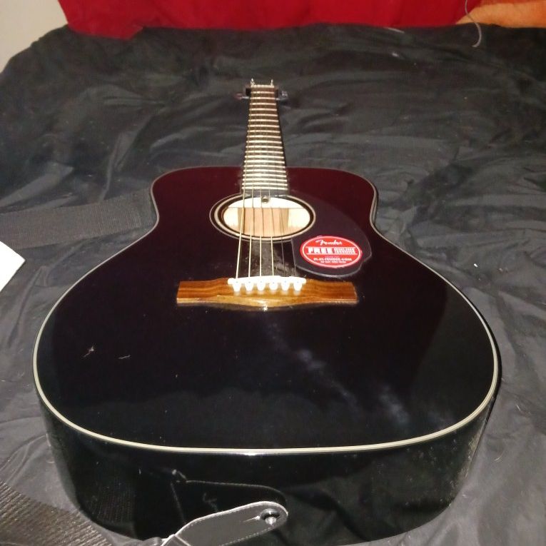 Black Fender Acoustic guitar