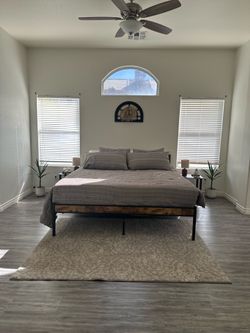 King bed with mattress and side tables