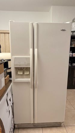 Whirlpool Side-by-Side Refrigerator with Ice Dispenser