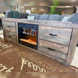 Trinell Brown Tv Stand With Electric Fireplace
Ashley Furniture$10 Down Payment And Financing Available
