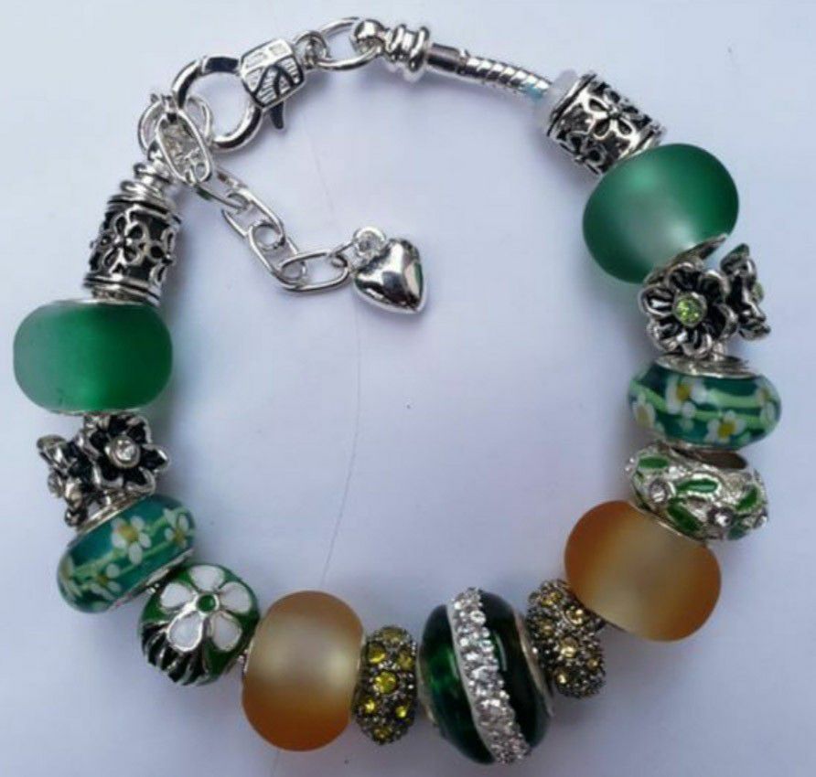 Green and yellow charm bracelet 1for $15 or 2 for $25