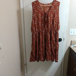Brown Dress With White And Blue Flowers