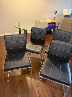 4 Black Faux Leather Dining Chairs