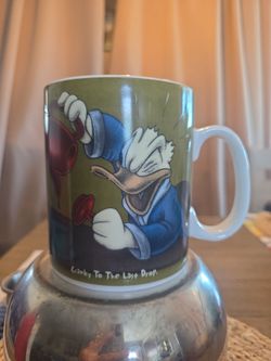 DINSEY VINTAGE LARGE 14OZ DONALD DUCK MUG.