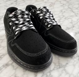 Travis Scott’s Jordan 1 Low Black Phantoms
