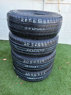 4 USED TIRES 205/65/15 SENTURY TOURING $250 CASH PRICE MOUNTED & BALANCE