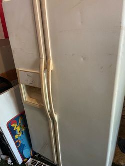 Whirlpool Side-by-Side Refrigerator with Ice Dispenser