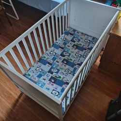 Baby crib with mattress