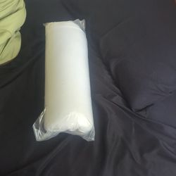 Brand new white queen-size sheet set with a pillow.