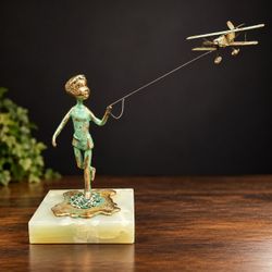 Malcolm Moran 1972 Bronze Boy Flying Model Airplane Sculpture MCM