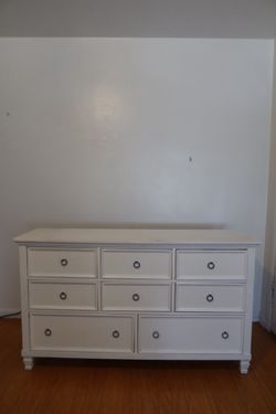 Full dresser with mirror attached.