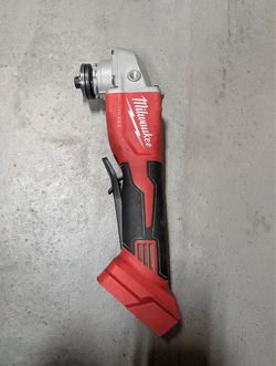 Used Milwaukee M18 18V Brushless Cordless 4-1/2 in./5 in. Grinder with Paddle Switch (Tool Only).