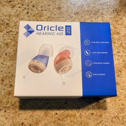BRAND NEW ORICLE 2.0 HEARING AID *100% COMPLETE AND UNUSED