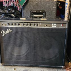 Fender FM 212R solid-state guitar amplifier.