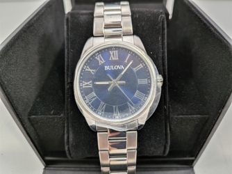 Bulova Men’s Watch – Model 96A228 Stylish and reliable Bulova wristwatch featuring a stainless steel case and band. The case back is marked “Bulova” w