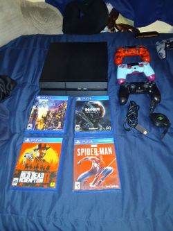 Playstation 4 with 3 controllers and games with all the cables it's all in good condition.