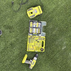 Ryobi Drill Set with bits and charging dock. No battery included