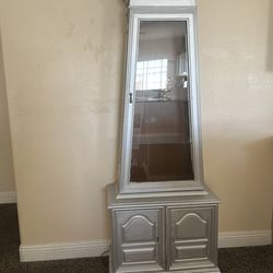 Silver curio cabinet with light