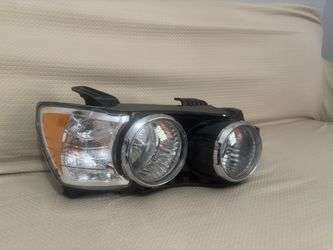 Headlight Chevy Sonic Drive Side Nueva