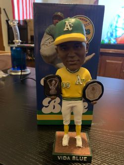 Vida blue bobble head
