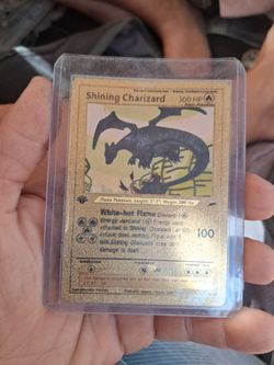 Shining charizard 1995 gold card