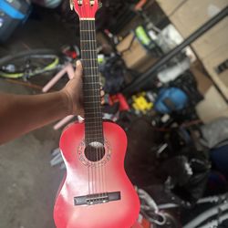 Bebop childs wooden guitar