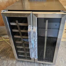 STAINLESS STEEL WINE COOLER AND BEVERAGE CENTER.....20 WINE BOTTLES AND 78 CAN CAPACITY........NEW.......$ 350