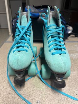 Turquoise color- Boardwalk quad roller skates with suede-style mint/turquoise boots and 57mm Boardwalk Sure-Grip wheels