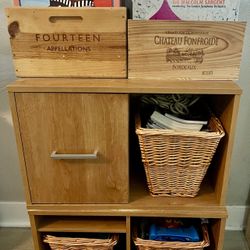 Two wooden stackable storage pieces