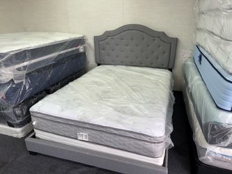 Gray Upholstered Bed Frame with Tufted Headboard