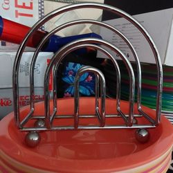 NAPKIN HOLDER. STRONGLY MADE; NOT CHEAPLY MADE. SEE PHOTOS.  CASH/PICKUP ONLY 