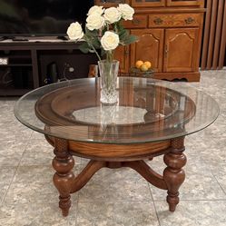 Ashley Millennium round wood and glass coffee table