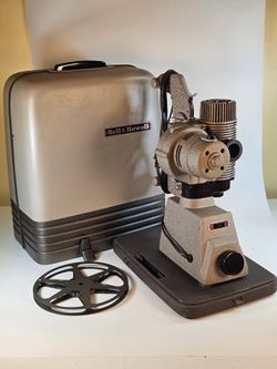 Vintage Bell & Howell 8mm Projector, case and screen